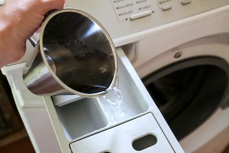 using vinegar as part of how to remove dog hair from clothes in washing machine
