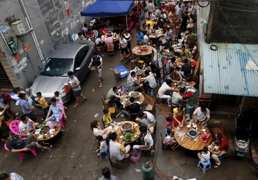 People eat dog meat at a dog meat restaurant district on the day of local dog meat festival in Yulin, Guangxi Autonomous Region, June 22, 2015. REUTERS/Kim Kyung-Hoon