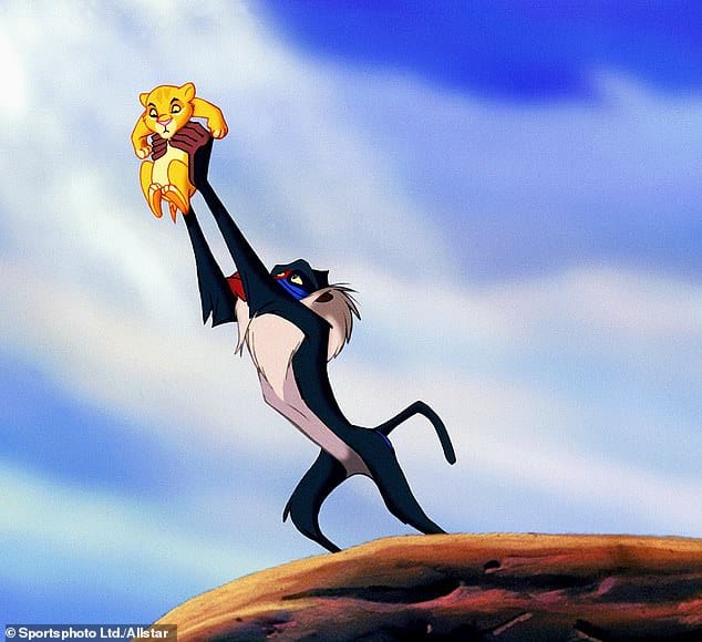 Watch: Male Baboon Steals a Cub and Recreates Famous Lion King Moment |